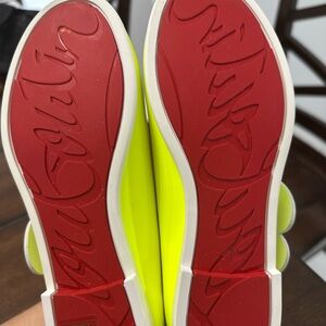 Christian Louboutin Bright Yellow Sneakers with Red Soles